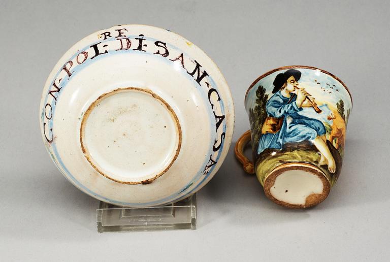 An Italian majolica cup and stand, Urbino, 18th Century.