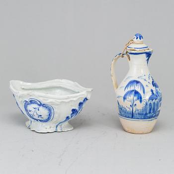 A faience tureen, unmarked, presumably Mariberg, 18th Century and a ewer with cover, 18th Century, unmarked.