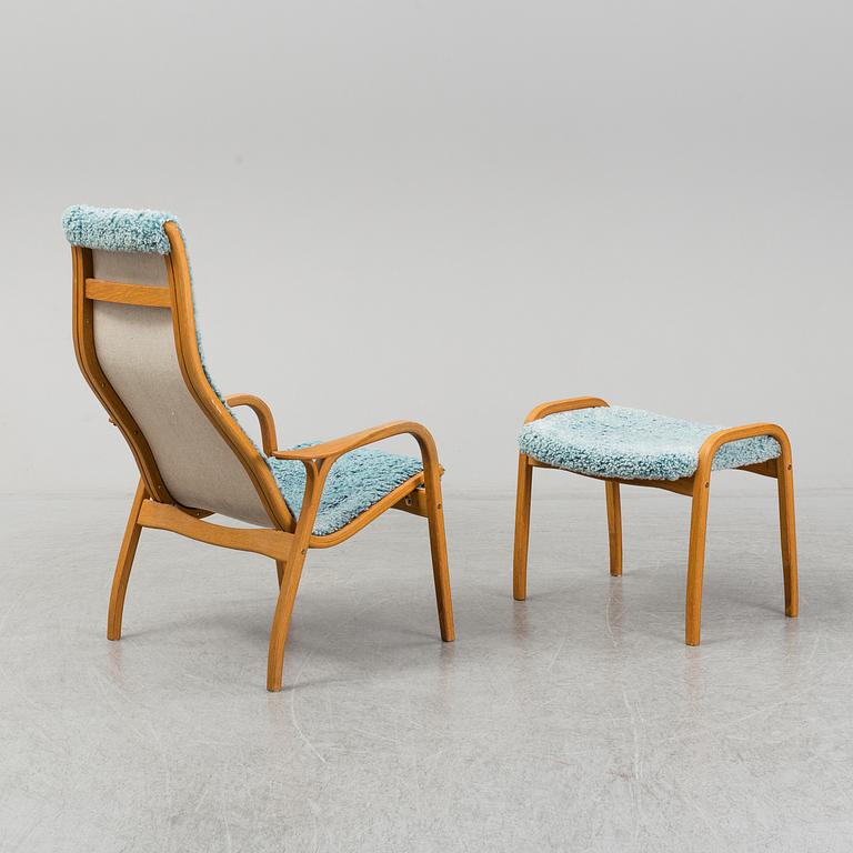 YNGVE EKSTRÖM, a 'Lamino' armchair with a stool, Swedese.