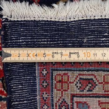 A Persian carpet, c. 445 x 320 cm.