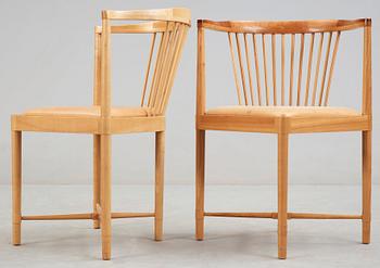A pair of Børge Mogensen 'Ruder Konge' cherry and beige leather chairs, Søborg Møbelfabrik, Denmark.