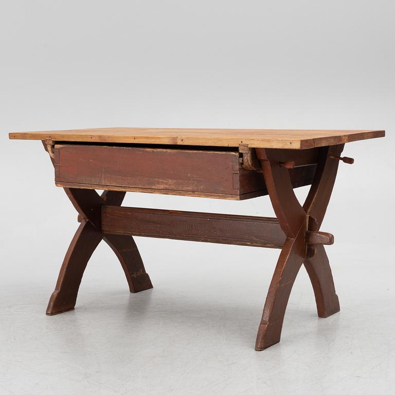 A Swedish folk-art trestle table from Dalarna, dated 1854.