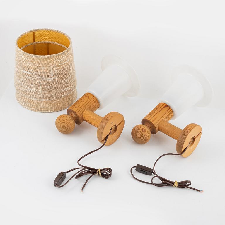 Uno & Östen Kristansson, a pair of pine wall lamps, Luxus, 1970s.