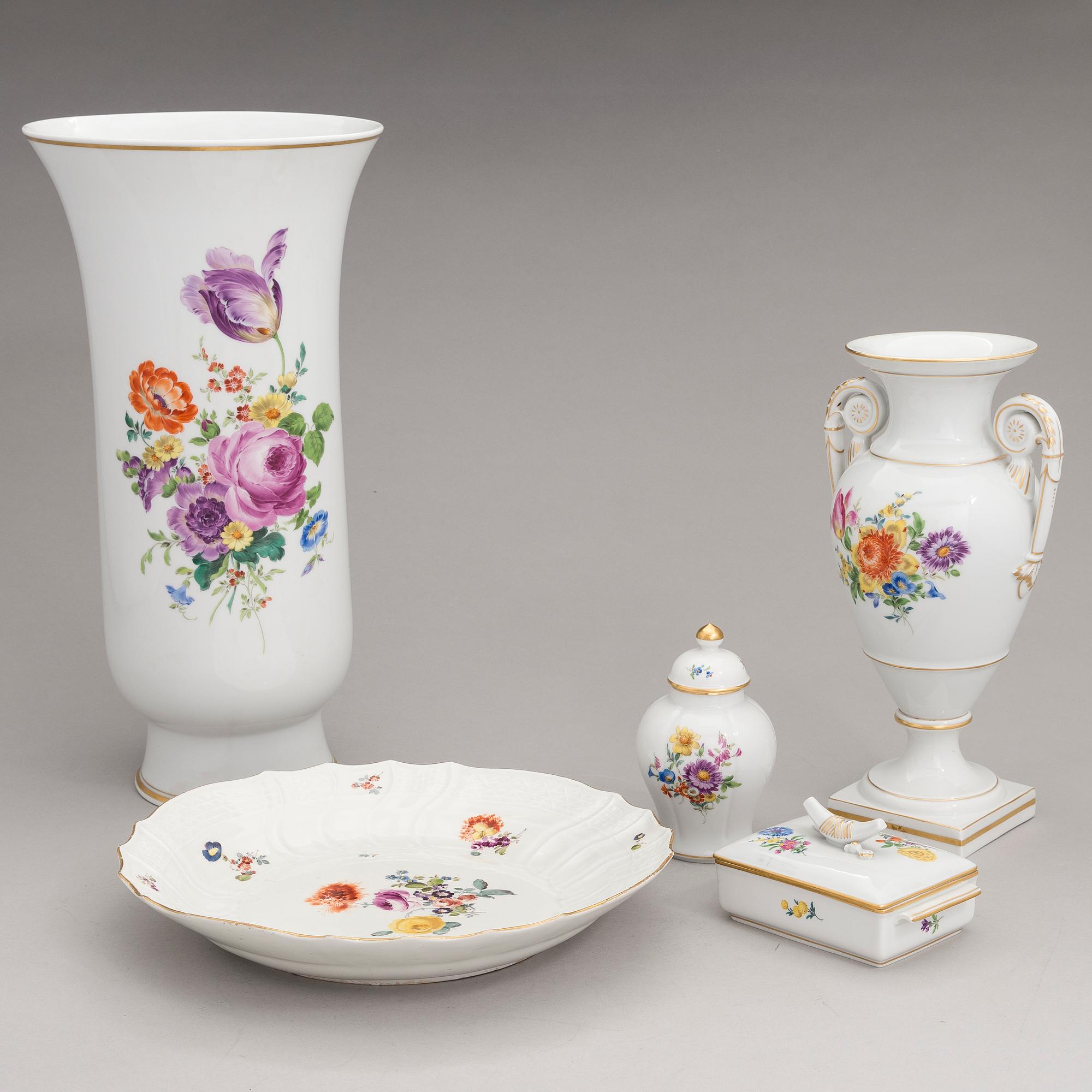 Two Meissen porcelain vases, a platter, an urn and a lidded box from the latter half of 20th century.