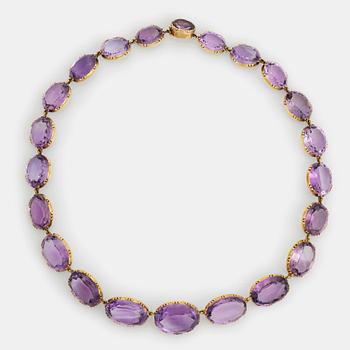 379. A 14K gold and amethyst necklace.