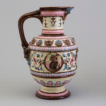 A creamware jug, circa 1900.