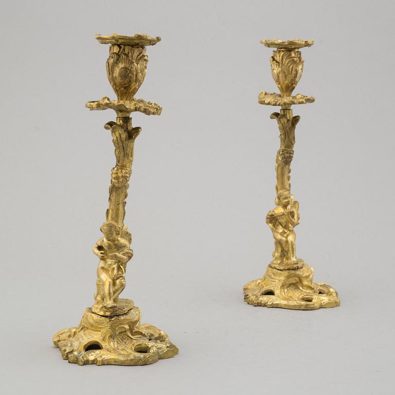 A PAIR OF ORMOLU ROCOCO STYLE CANDLESTICKS, 19th century.