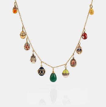 919. Fabergé, m fl, halskedja med 11 påskägg, guld, emalj, diamanter mm, olika verkmästare, varav 8 S:t Petersburg.