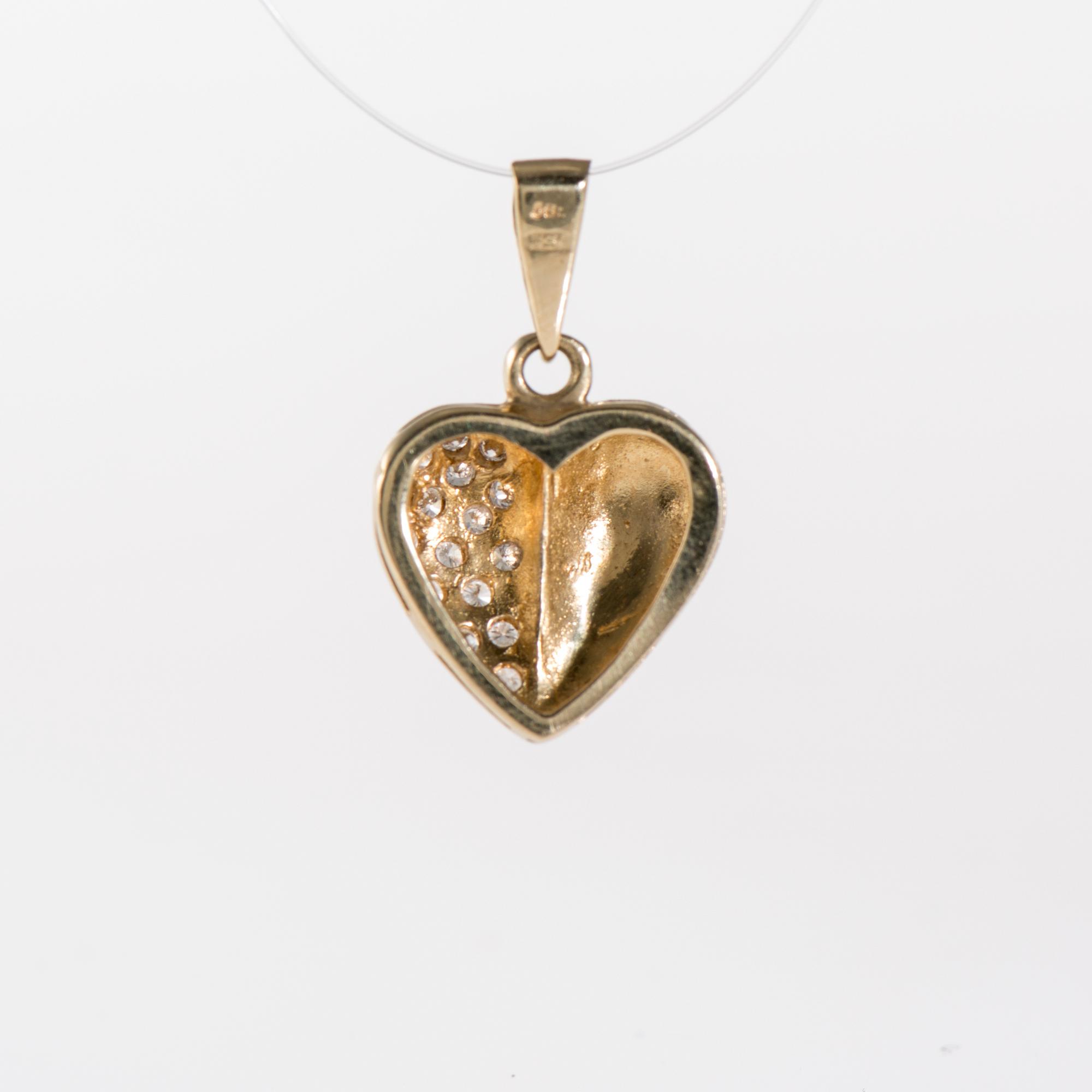 HÄNGE, 14K guld, 16 små diamanter. Vikt 2,6 g.