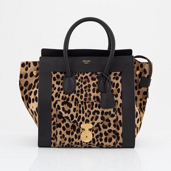 Céline, a leopard pony hair 'Mini shopper' bag.