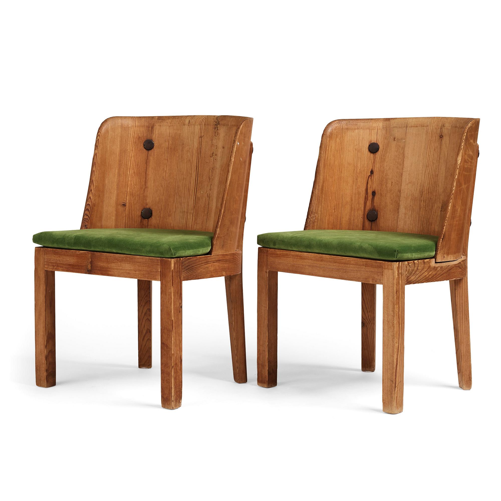 Axel Einar Hjorth, a pair of stained pine 'Lovö' chairs, Nordiska Kompaniet Sweden 1930s.