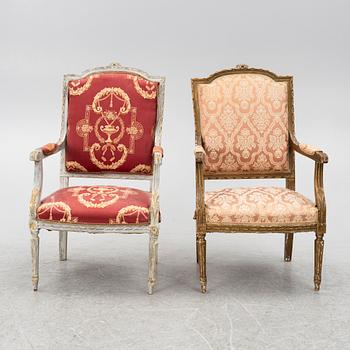 A pair of Louis XVI-style armchairs and a sofa, 20th century.
