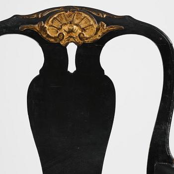 A pair of Swedish rococo open-back armchairs, Stockholm, late part 18th century.