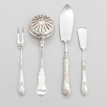 Four pieces of Russian silver cutlery.