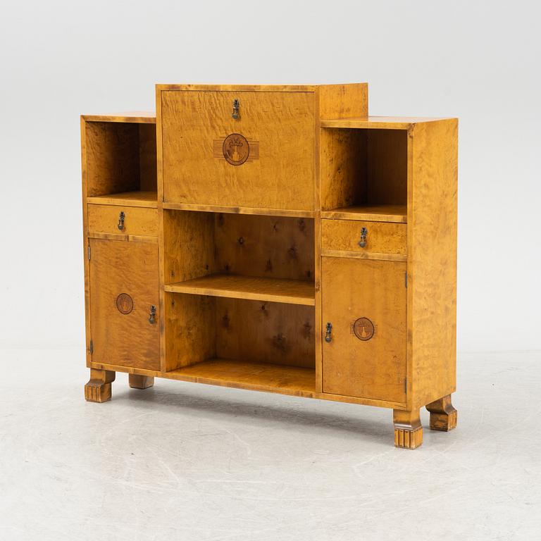 A 1930's birch veneered bookcase/sideboard.