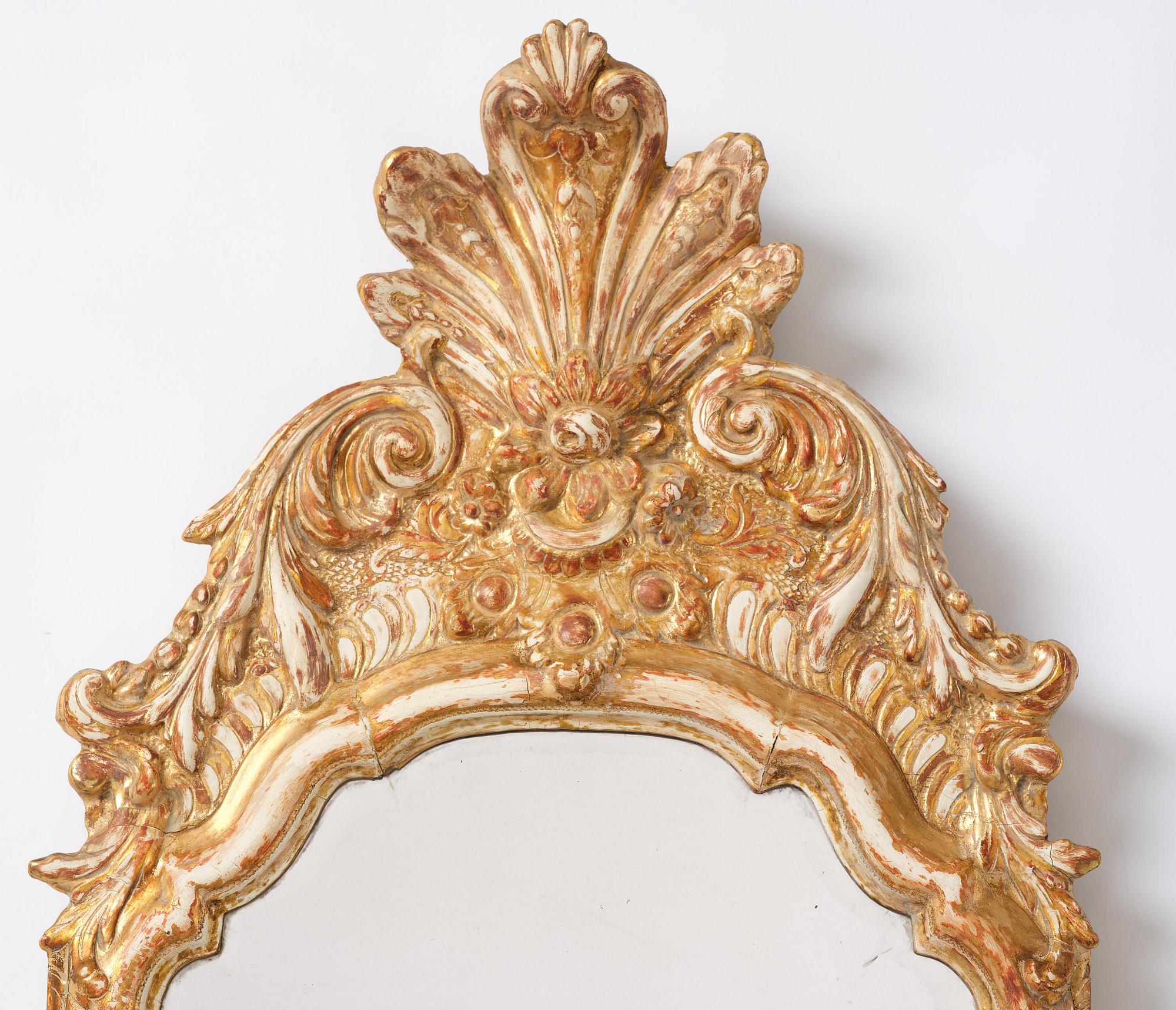 A Swedish Rococco mirror, late 18th century.