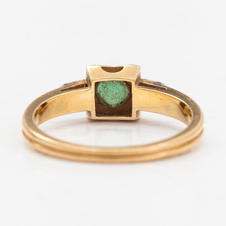 An 18K gold ring, diamonds totalling approx. 0.06 ct and emerald. Auran Kultaseppä Oy, Turku 1956.