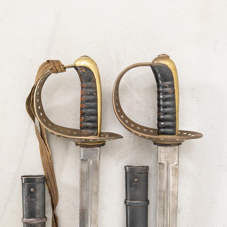 Two Swedish sabres, 1893 cavalry pattern, with scabbards.