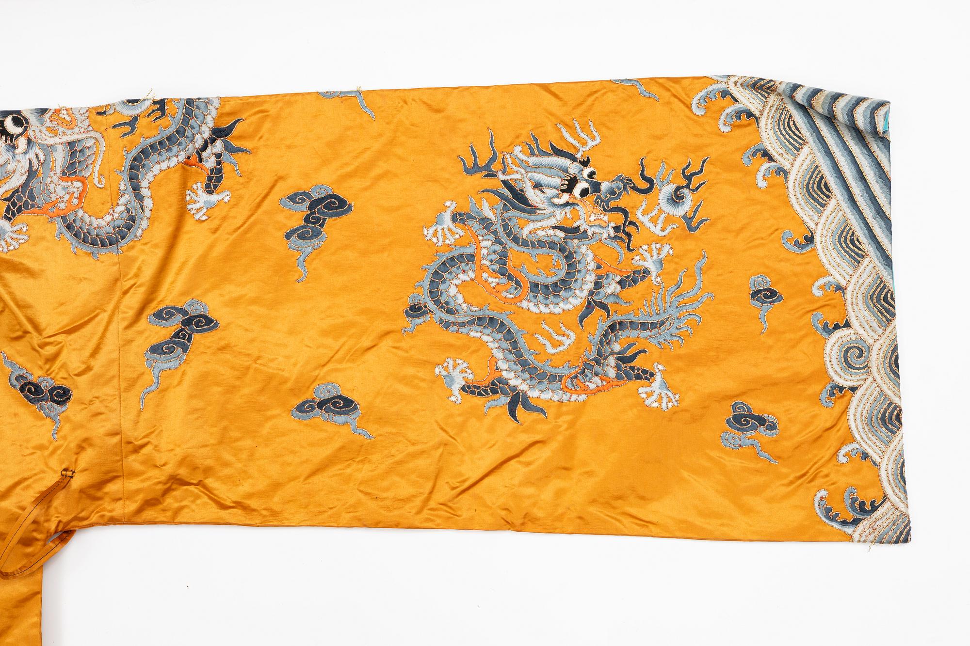 A Chinese embroidered silk robe, 20th century.