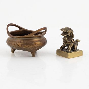 A Chinese bronze seal stamp and a tripod censer, late Qing dynasty, 19th century.