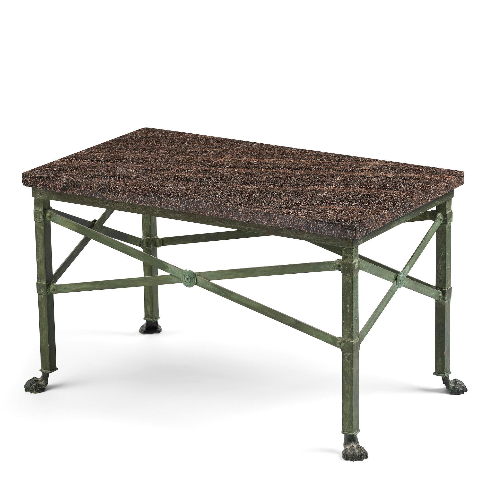 A table with Swedish 'Orrlok' porhyry top, early 19th century on a later bronze stand.