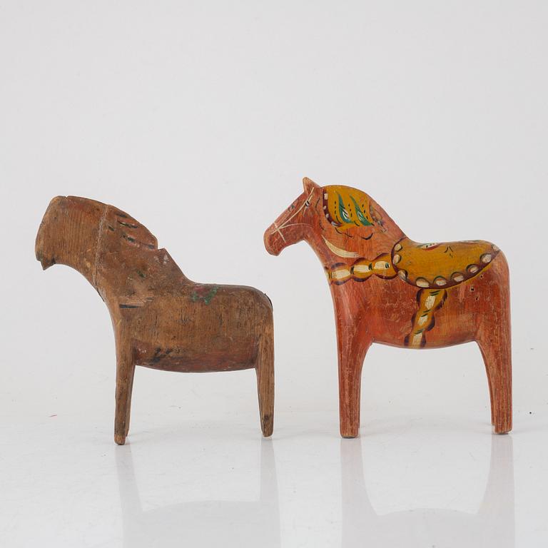 A pair of Swedish 'Dala' Horses, carved wood, early 20th century.