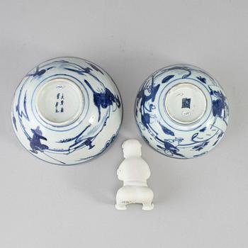 A set of two blue and white bowls and a figurine, Ming dynasty and Qing dynasty, 17th Century.