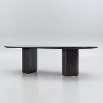 Space Copenhagen, a 'Moon' dining table, Gubi, Denmark.