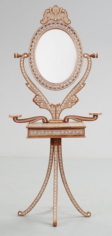 An 20th Century oriental style dressing mirror.