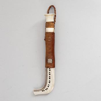 Lars Pirak, a reindeer horn knife, signed.