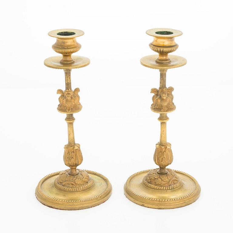A pair of early 20th century candlesticks.