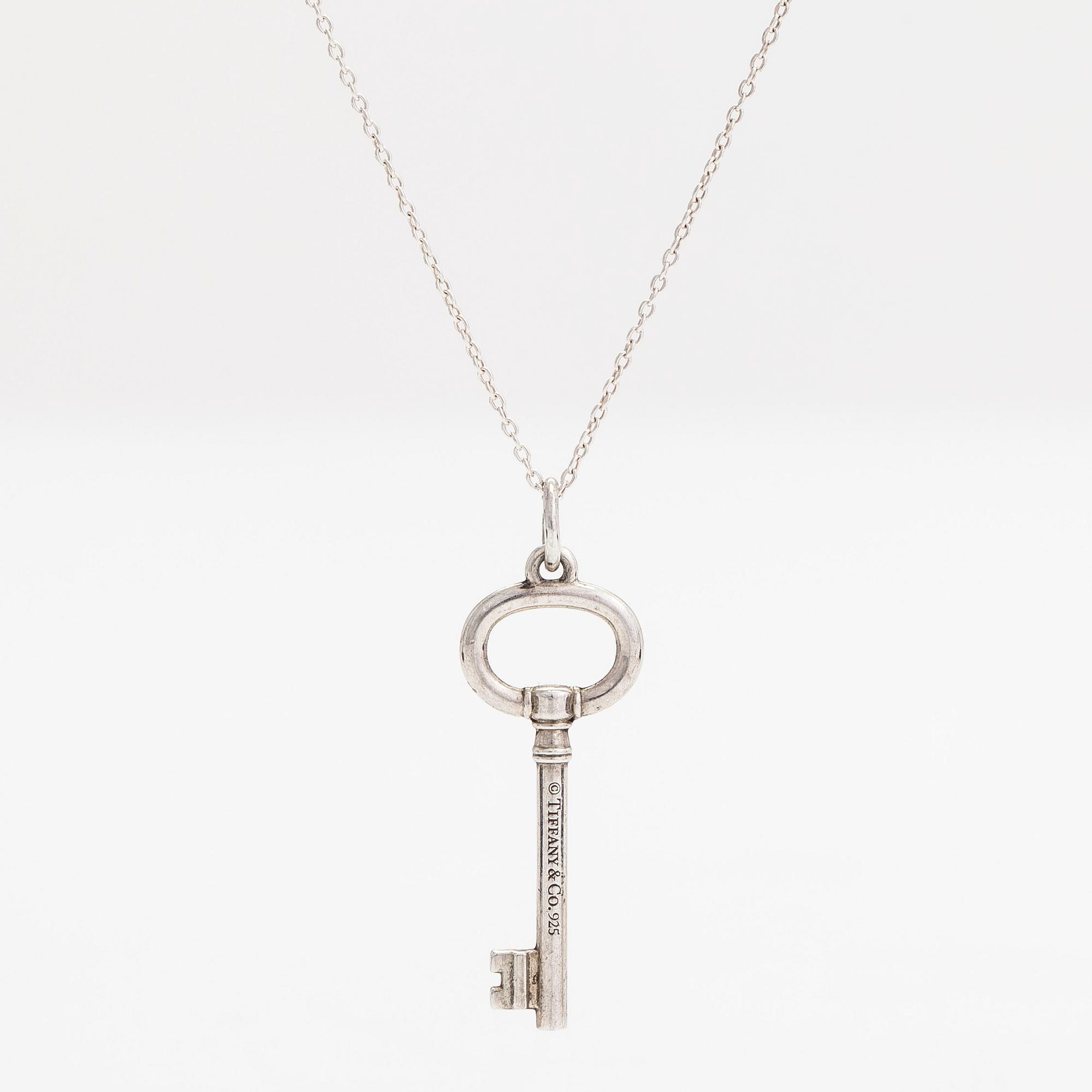 Tiffany & Co, A sterlingsilver pendant with chain.
