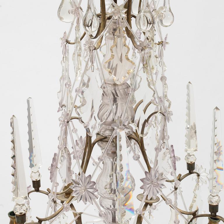 A six-light rococo-style chandelier, late 19th century incorporating older elements.