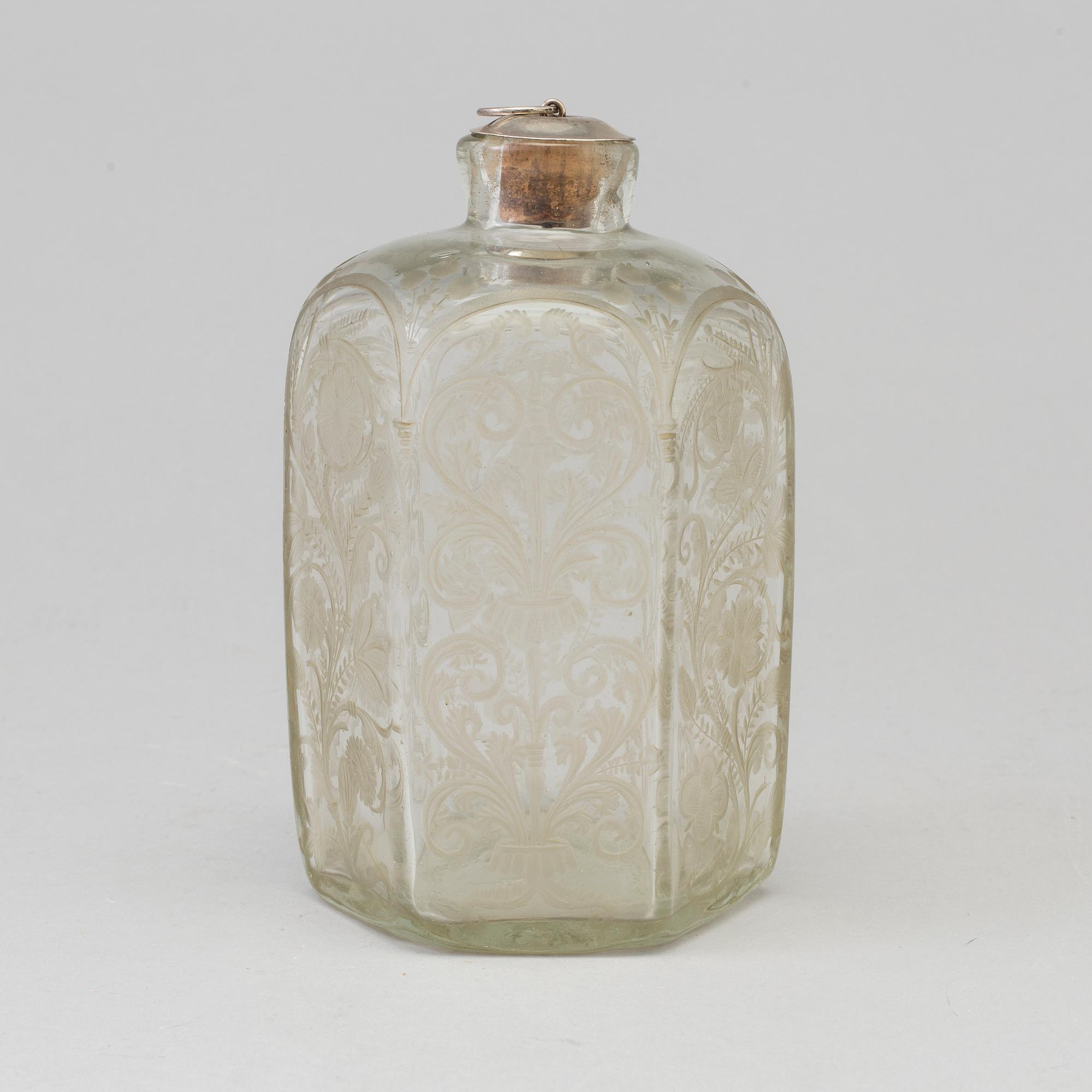 A baroque glass bottle, first half of the 18th century.