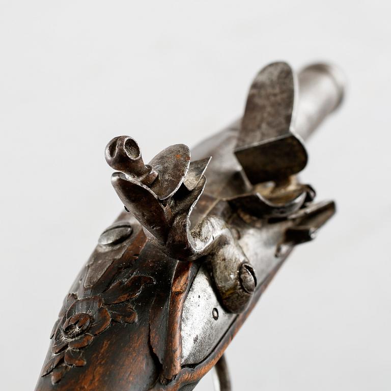 A flintlock gun, 18th century.
