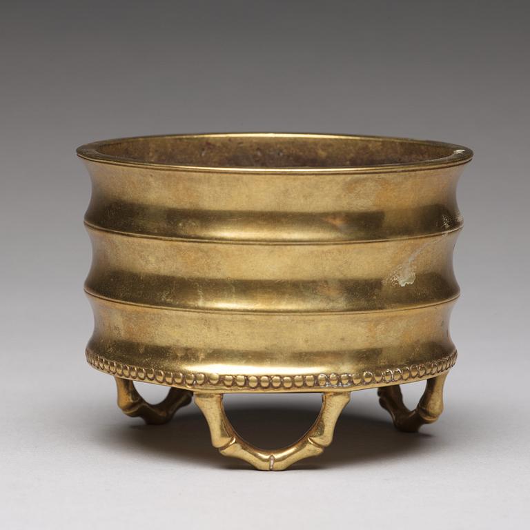 A bronze incense burner, Qing dynasty.