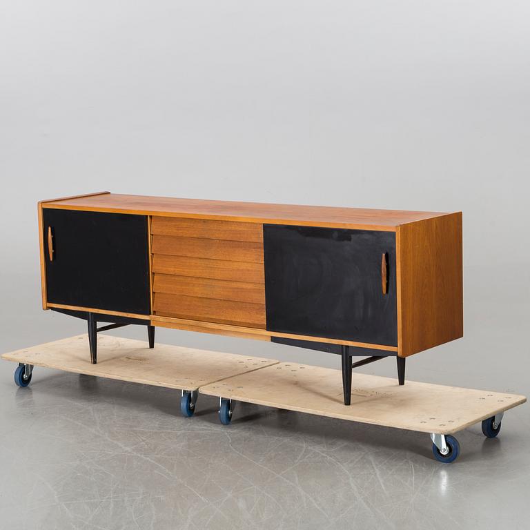 A teak sideboard with black details, by Troeds Sweden, 1960's.