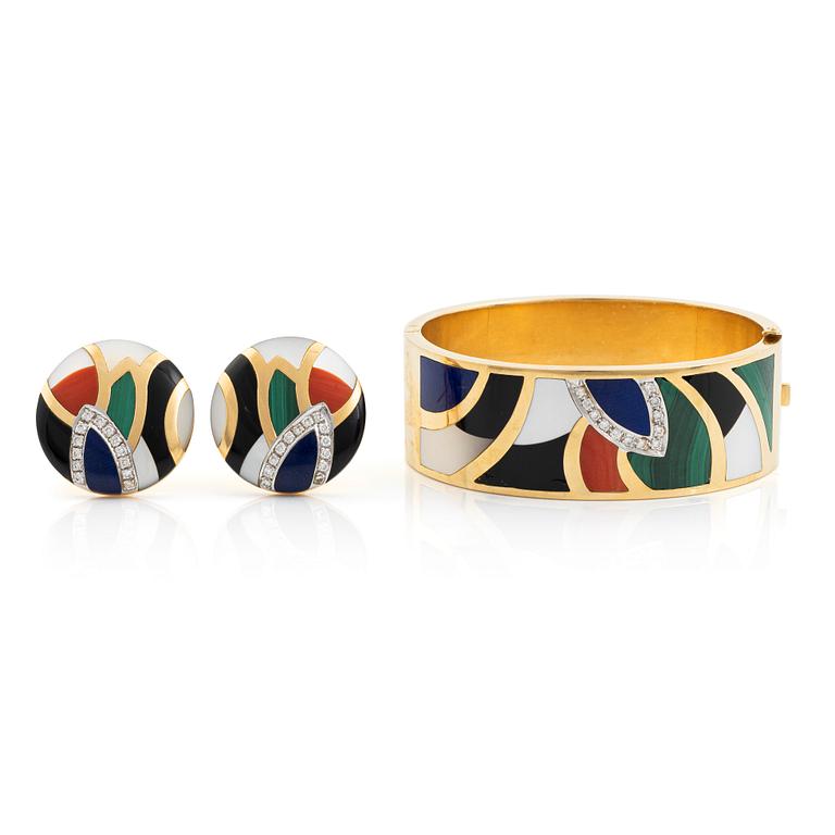 A Black Starr & Frost bracelet and a pair of earrings.