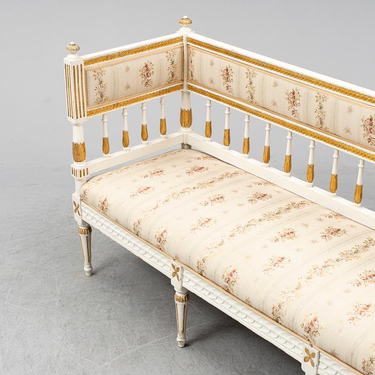 A late gustavian sofa, ca 1800.