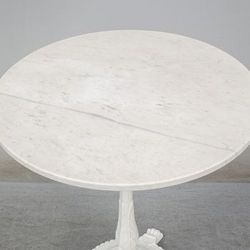 A cast iron and marble café table from Byarum.