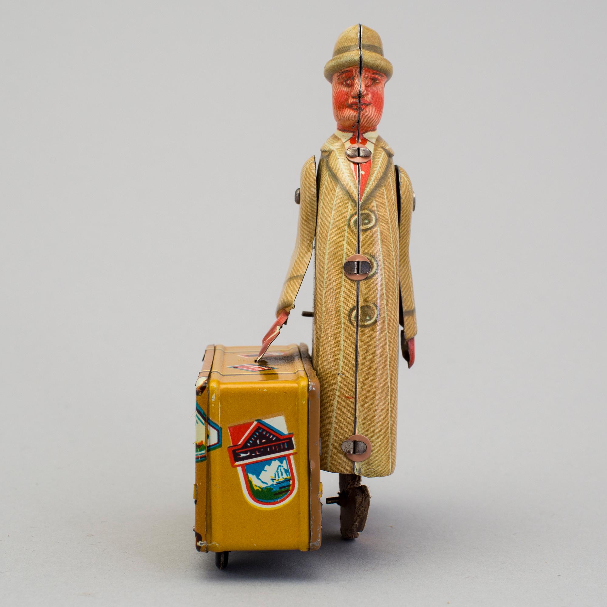 A tinplate Fritz Voith man with suitcase, Germany, 1950s.