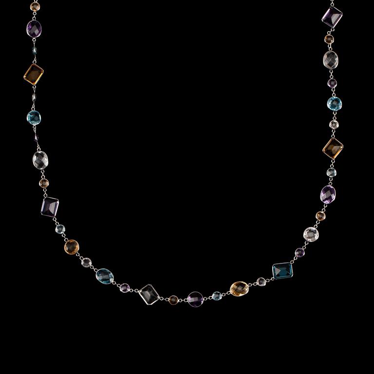 A necklace with faceted amethysts, citrines and blue and white topaz, tot app. 102 cts.