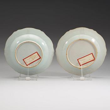 A set of seven deep and three flat famille rose 'double peacock' dishes, Qing dynasty, Qianlong.