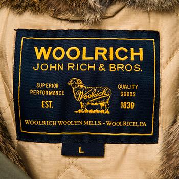 Ladies Woolrich Military Parka in size L.