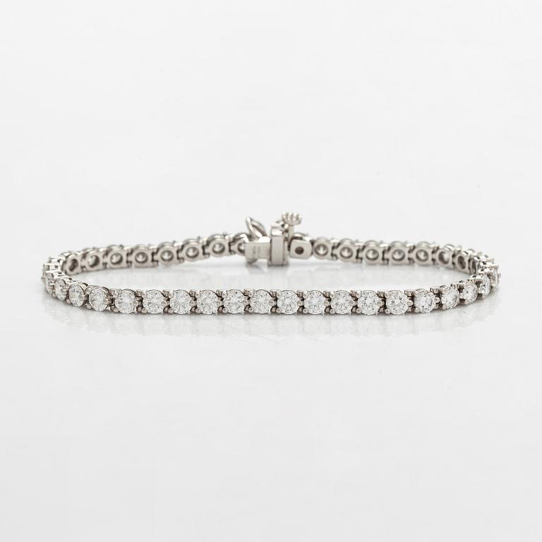 Tiffany & Co, "Victoria" tennisrannekoru, platinaa sekä briljantti- ja marquisehiottuja timantteja.
