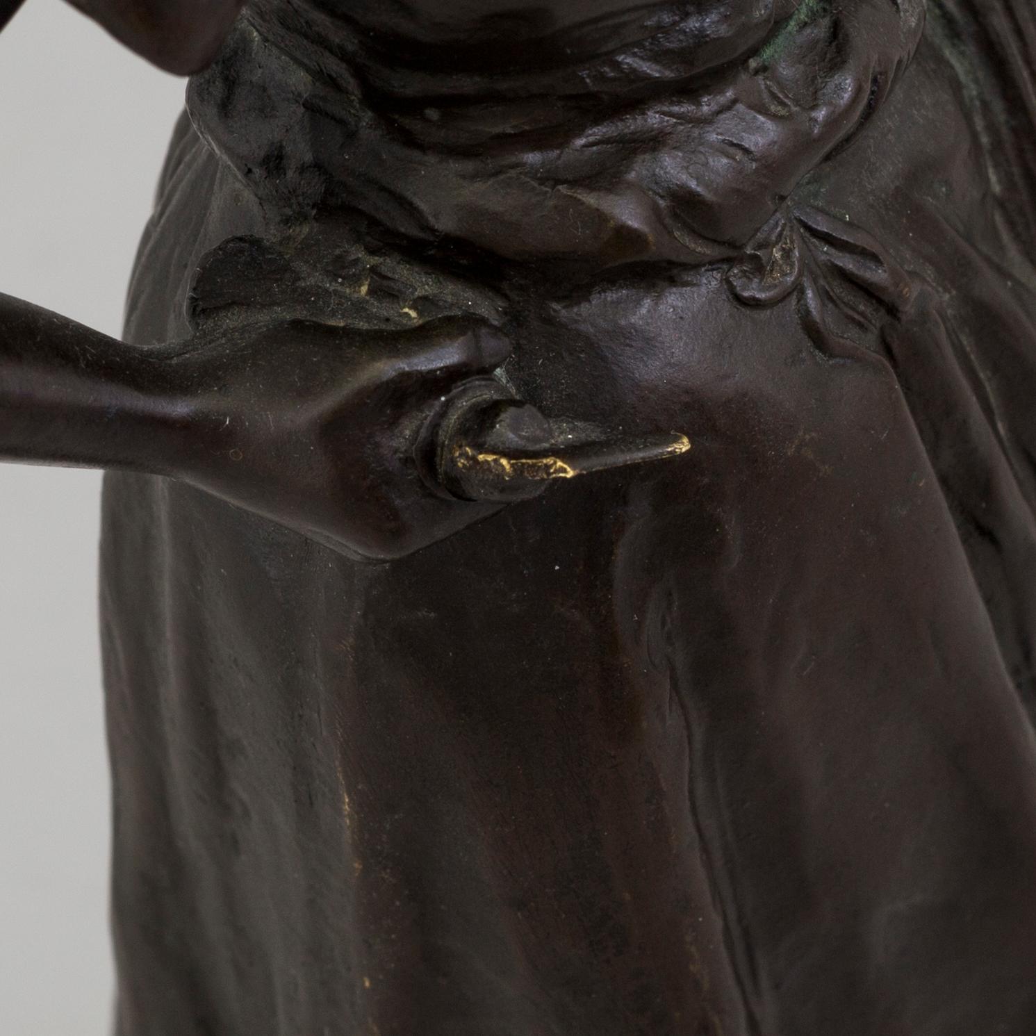 A SCULPTURE, after Max Valentin, signed M. Valentin,