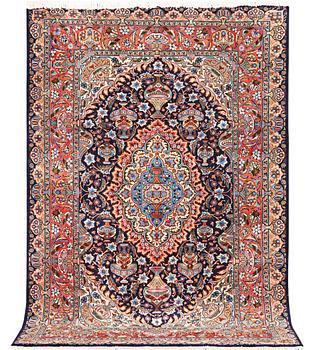 A Kashmar carpet, c. 310 x 203 cm.