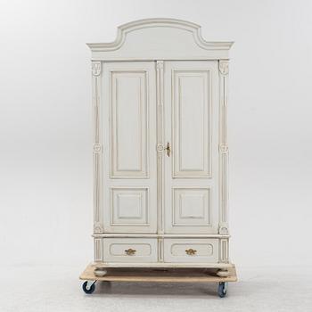 An Art Nouveau clothes cabinet, around 1900.