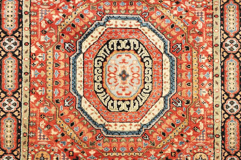 A Mamluk design carpet, c. 304 x 235 cm.