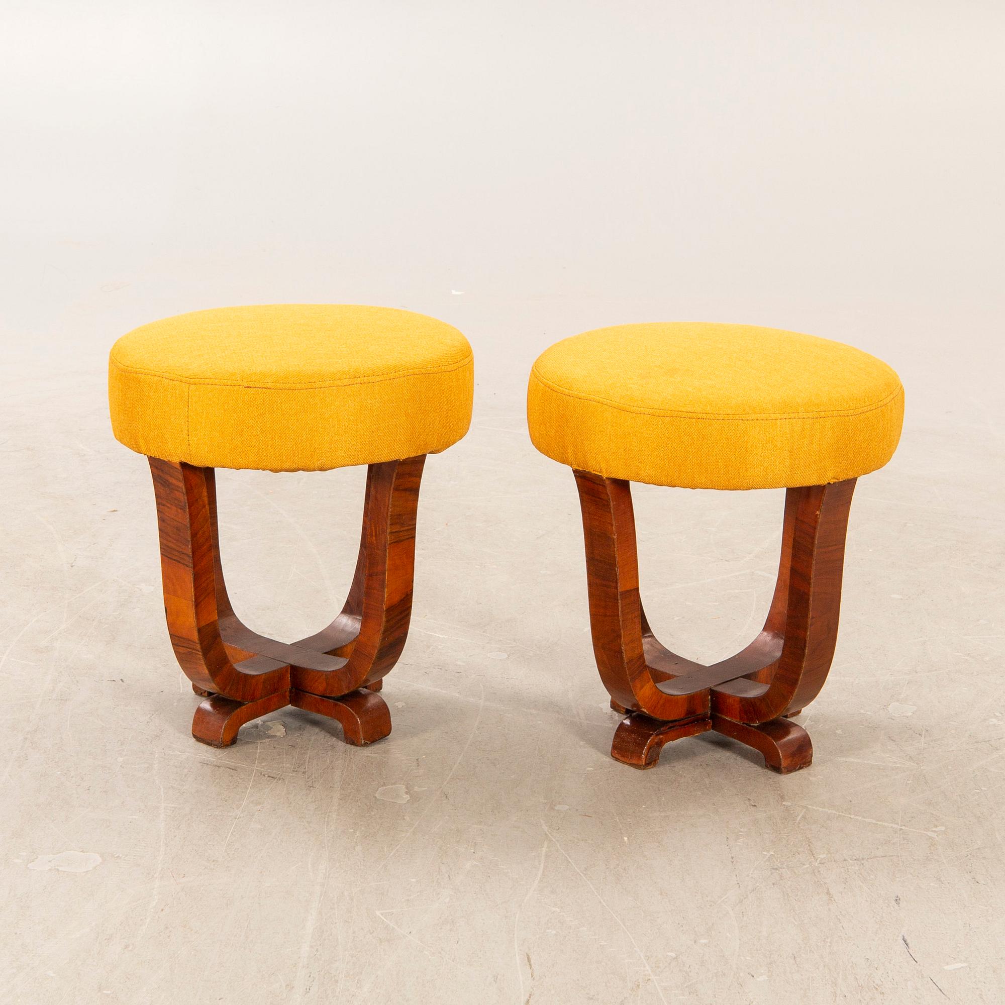 a set of two Art Deco walnut stools first half of the 20th century.
